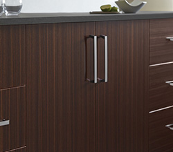 Berenson Hardware on Dark Cabinets